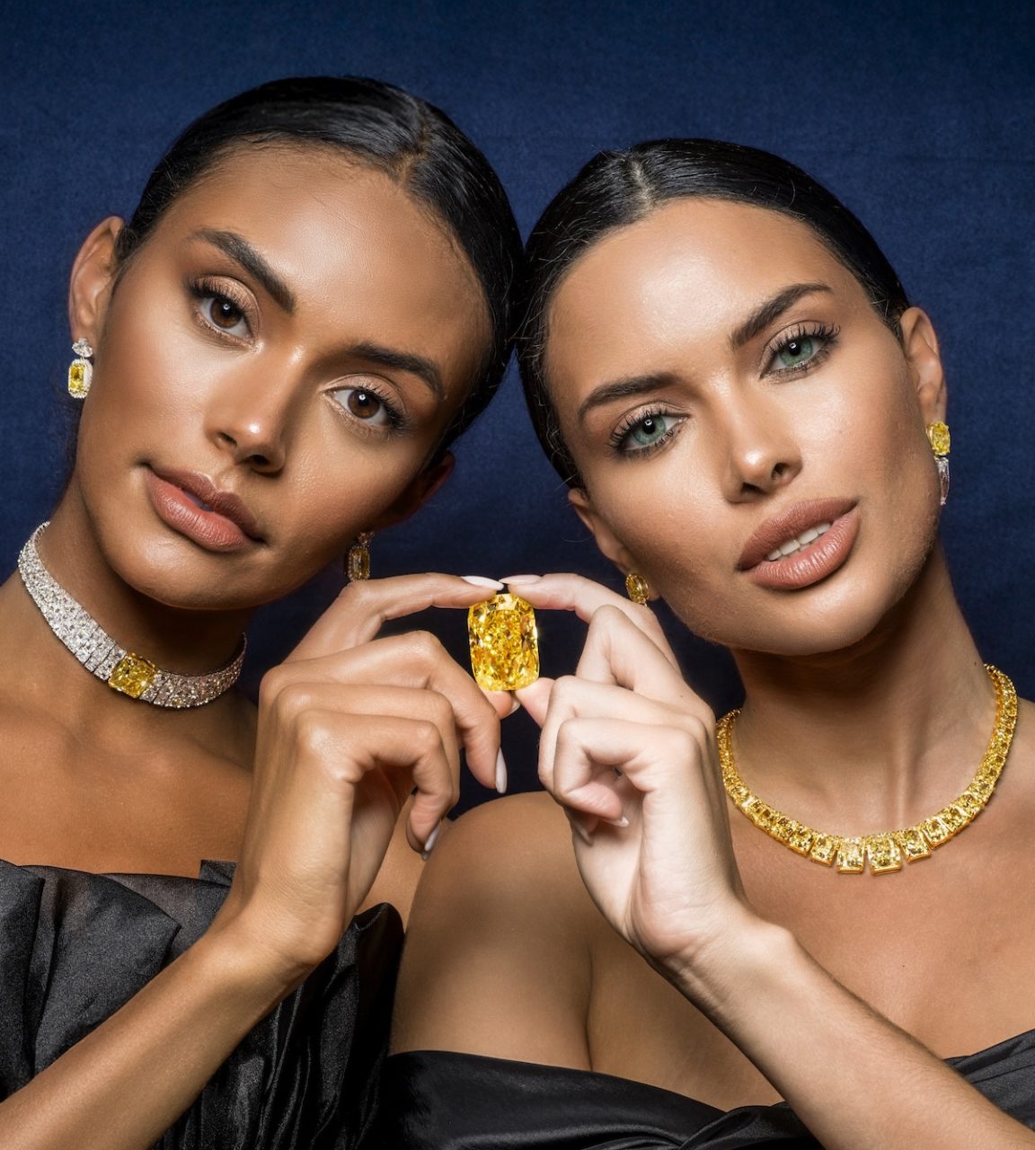 The Golden Royale Sun — Fancy Vivid Yellow diamond against a model's skin